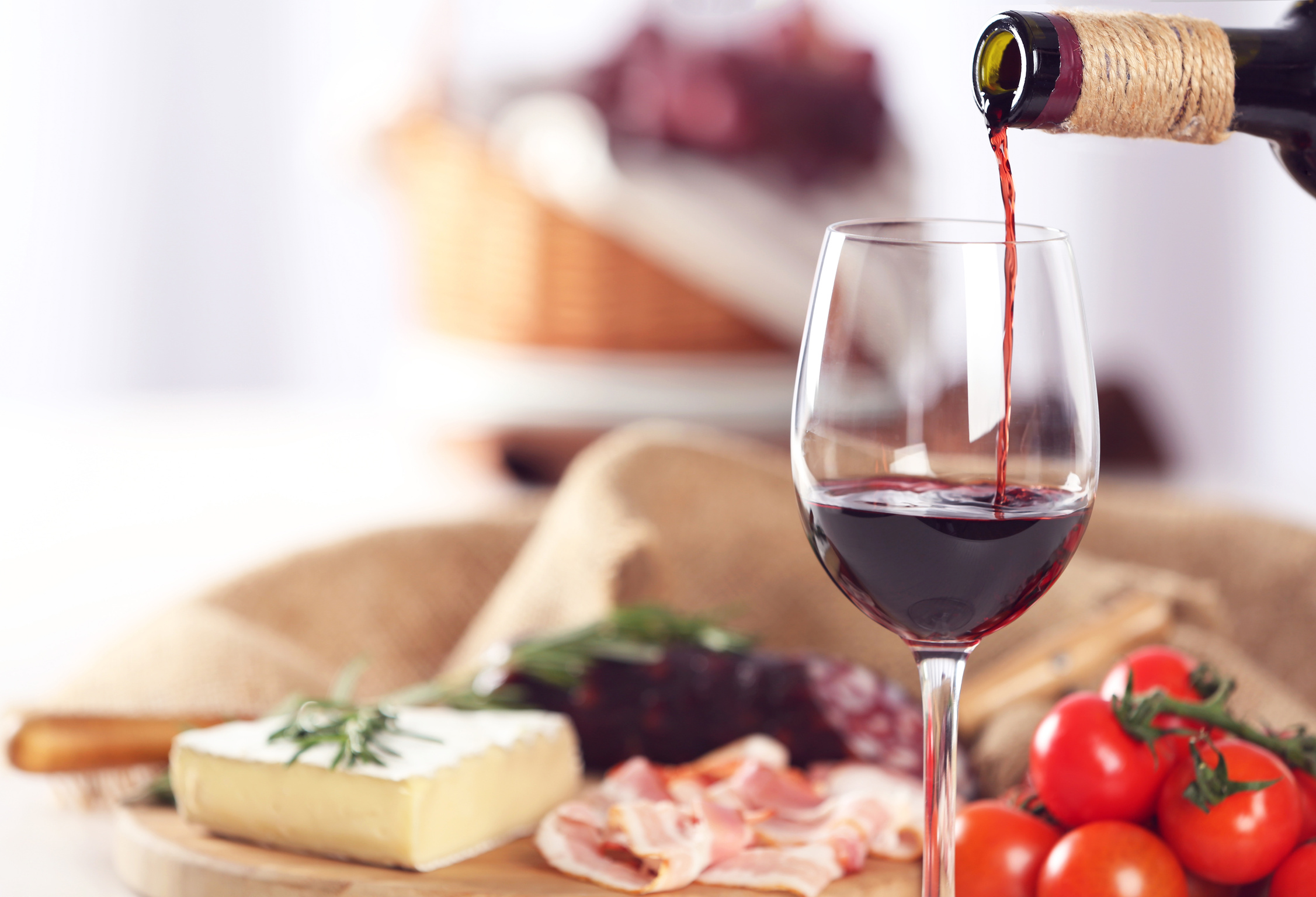 Pouring Red Wine into a Glass Up Close 